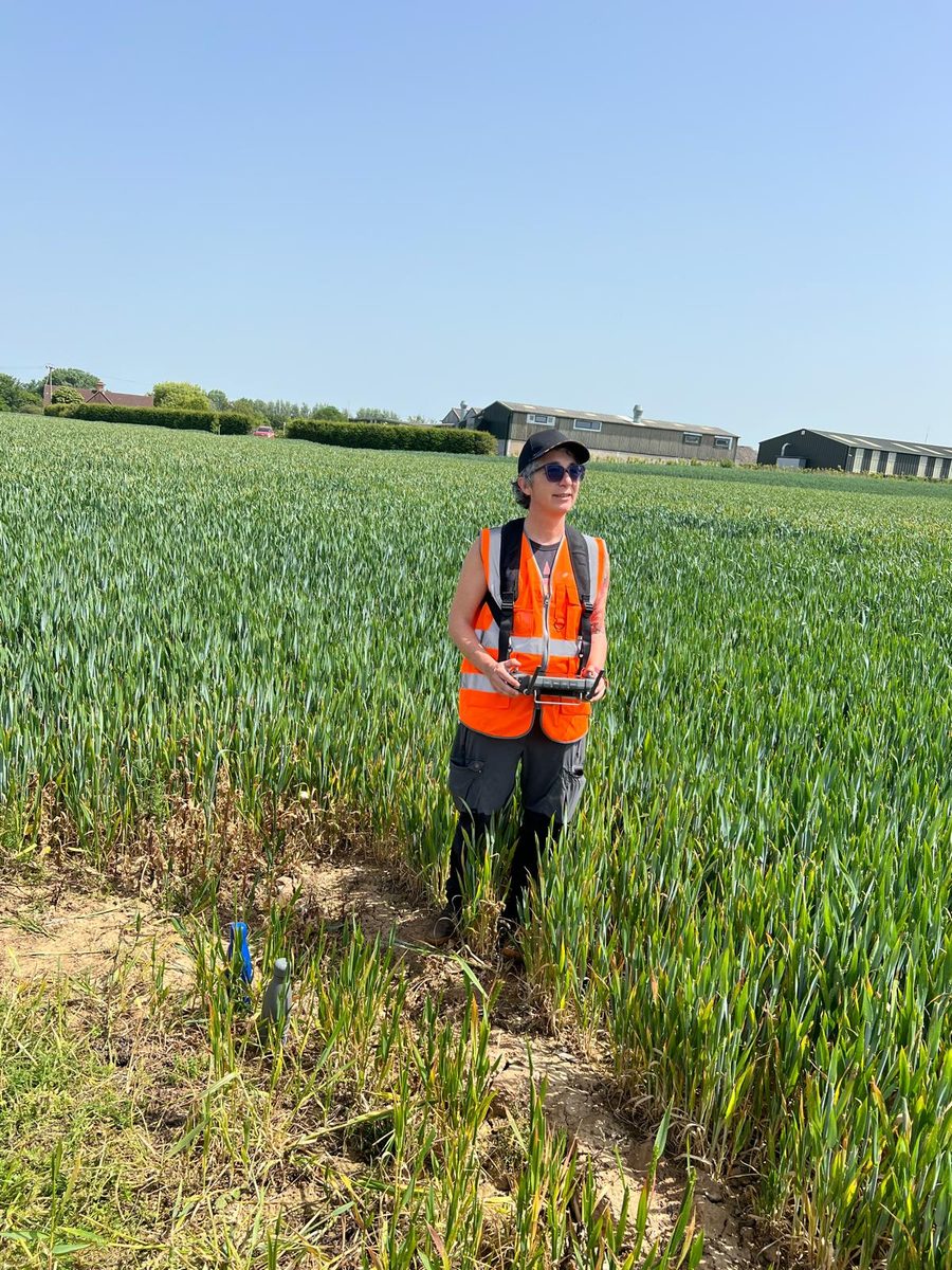 Clara Gonzalez Hernandez in a high-visibility vest in a field