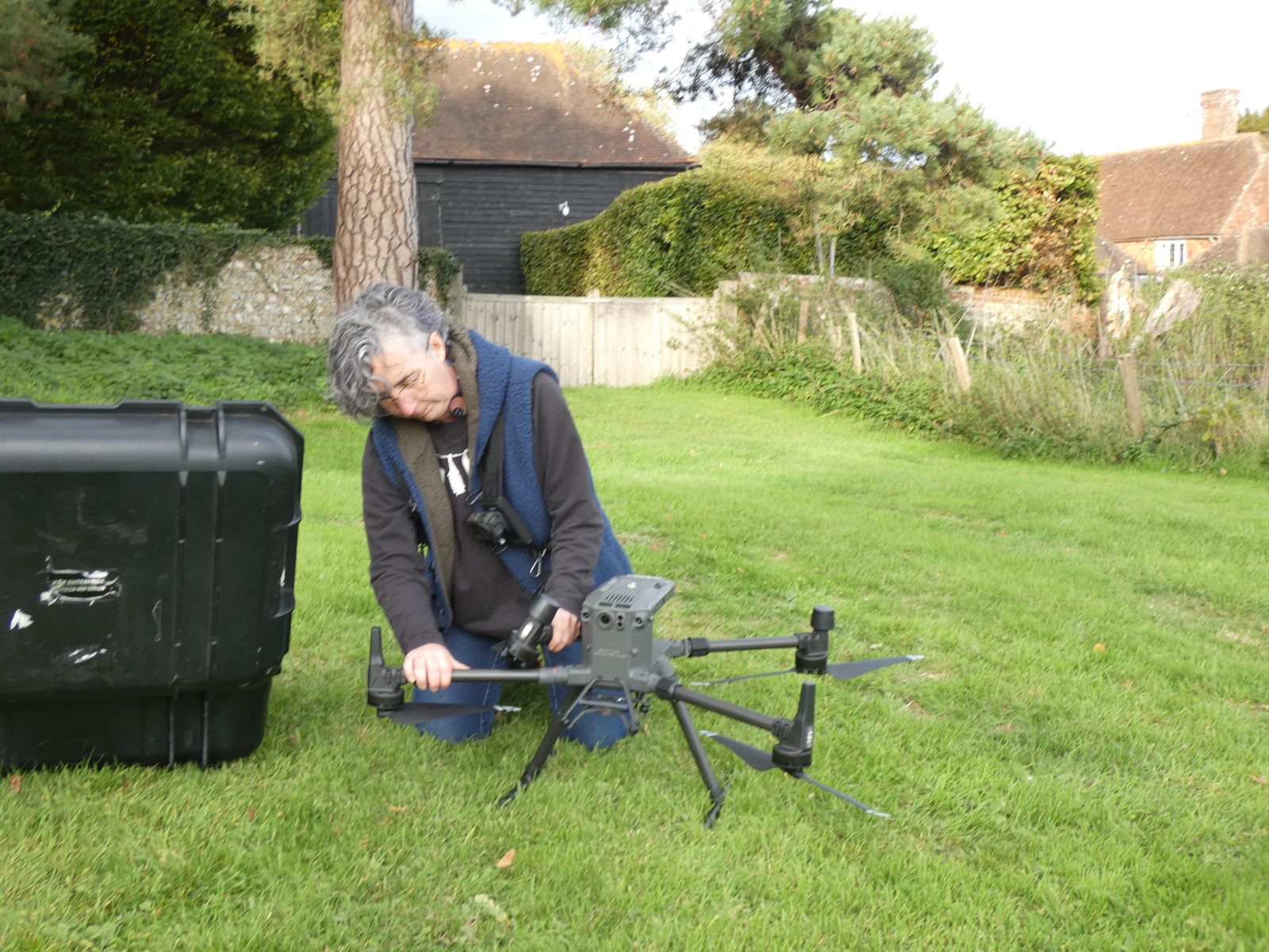 Preparing a thermal drone for flight beside its equipment case